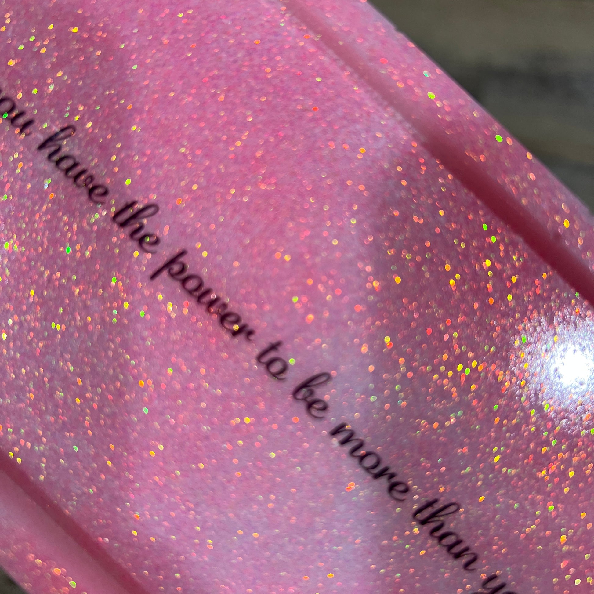 Close up of Pink and white glitter resin tray with quote “you have the power to be more than you realize”